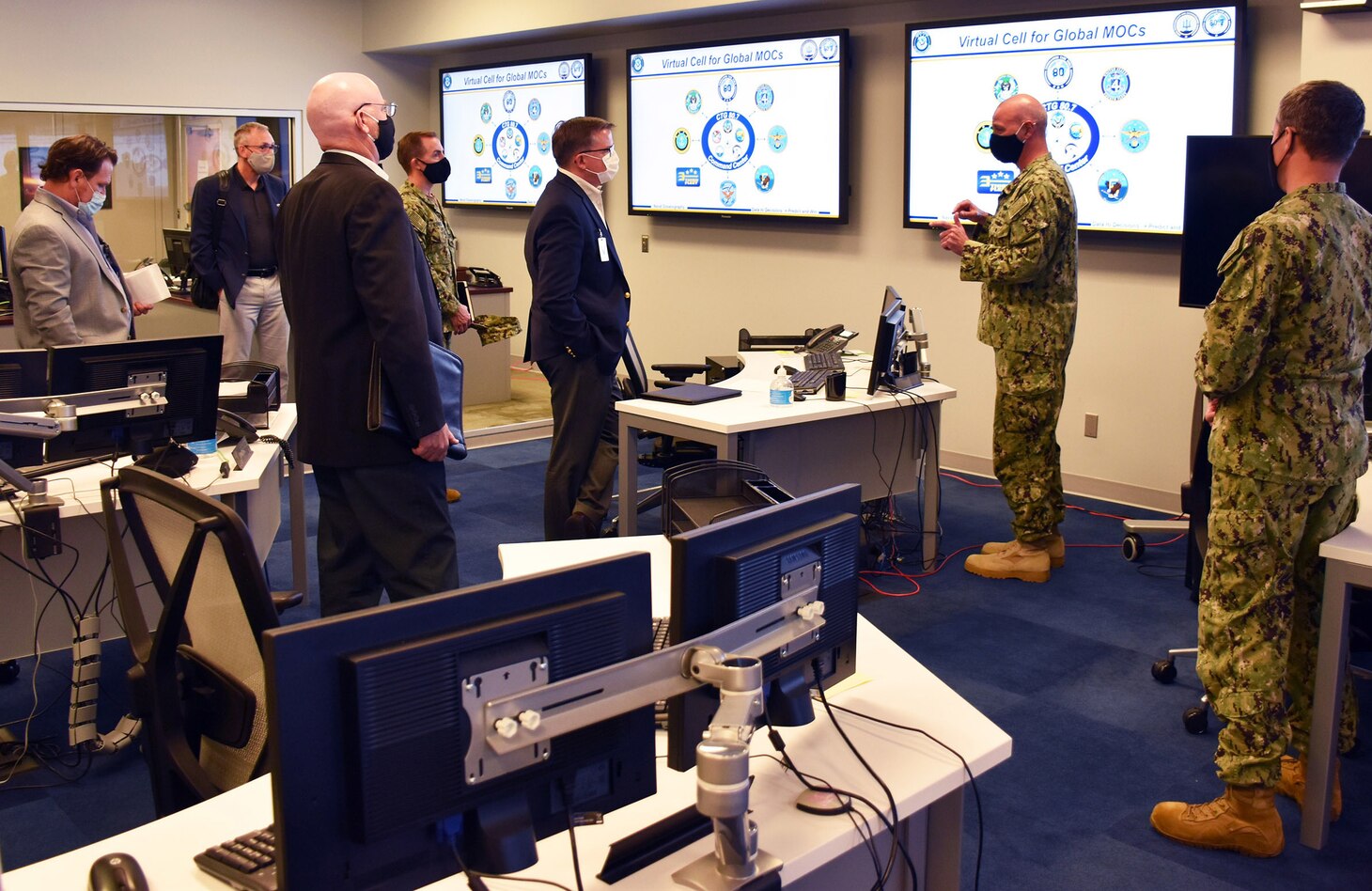 Dr. William Burnett, Technical Director of Commander, Naval Meteorology and Oceanography Command (CNMOC), and Mr. James Griffith, National Geospatial-Intelligence Agency (NGA) Director, Source Operations and Management Directorate—along with other NGA personnel—received a detailed overview of CNMOC with a full brief and engagements with subject matter experts. CNMOC directs and oversees more than 2,500 globally-distributed military and civilian personnel who collect, process and exploit environmental information to assist Fleet and Joint Commanders in all warfare areas to make better decisions faster than the adversary.