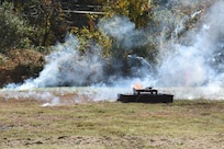 Fire and smoke flare up during a battery burn demonstration on Nov. 4, 2021, at Aberdeen Proving Ground in Maryland.