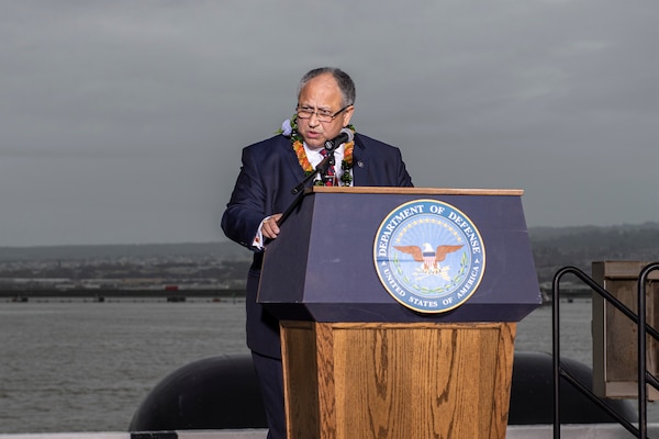 Secretary of the Navy (SECNAV) Carlos Del Toro delivers remarks during the 80th Anniversary Pearl Harbor Remembrance.