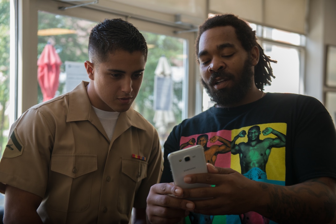A Detroit veteran speaks about his time in the military at a luncheon with a U.S. Marine from the Special Purpose Marine Air Ground Task Force (Detroit) as part of Marine Week Detroit, September 7, 2017 at Southwest Solutions Piquette Square. Marine Week Detroit is an opportunity to showcase the Corps’ capabilities and missions as America’s expeditionary force in readiness.
