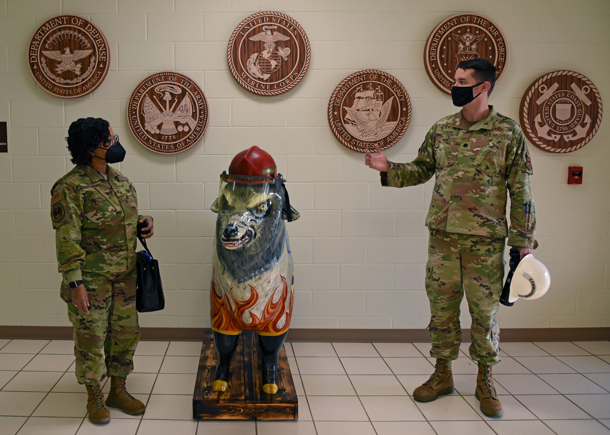 U.S. Air Force Col. Donnette Boyd, AETC command chaplain, meets with Lt. Col. Samuel Logan, 312th Training Squadron commander at the Louis F. Garland Department of Defense Fire Academy on Goodfellow Air Force Base, Dec. 2, 2021. Boyd toured the 312th TRS to learn more about the mission and students and available resources. (U.S. Air Force photo by Airman 1st Class Sarah Williams)