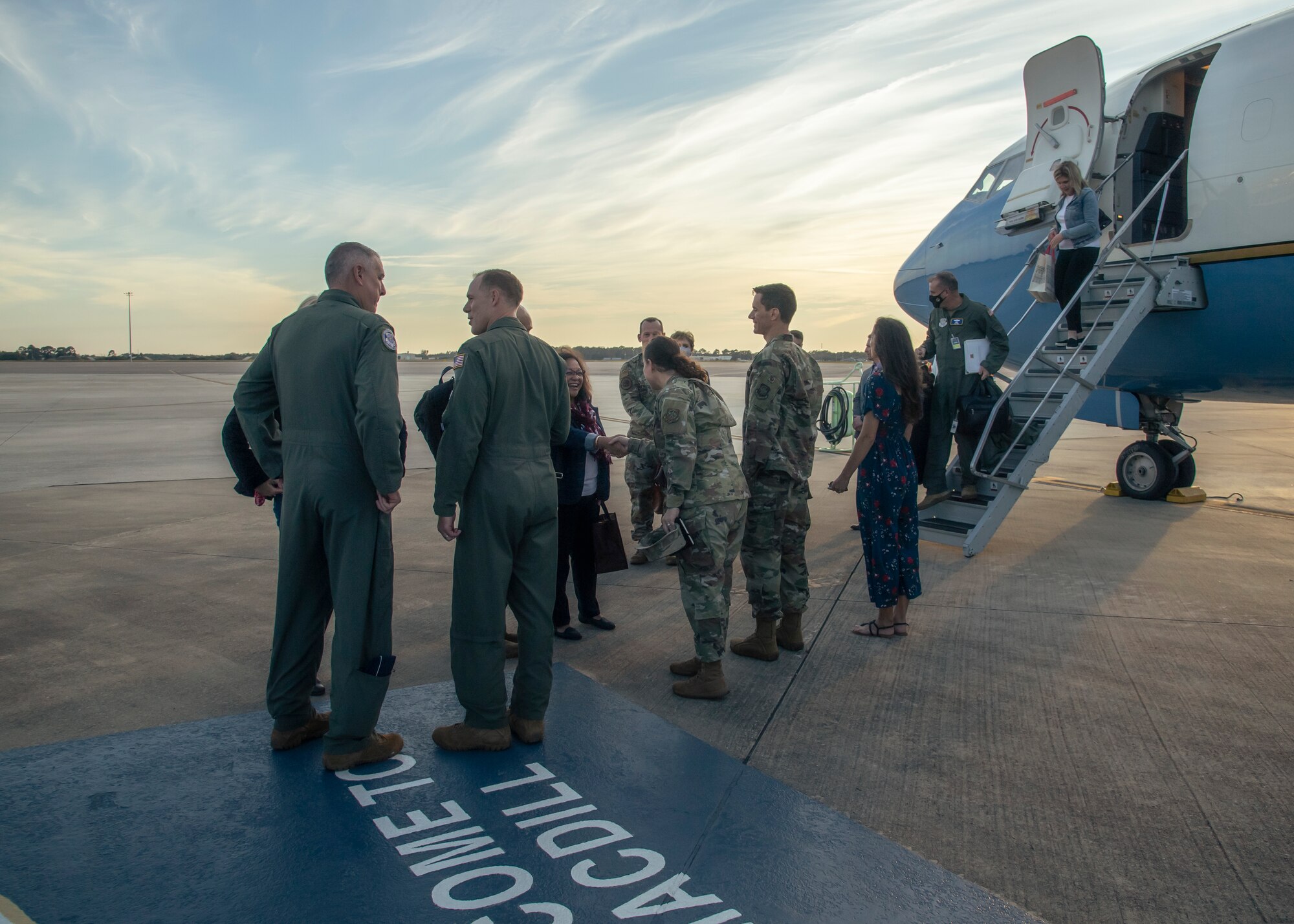 U.S. Air Force Gen. Mike Minihan, commander of Air Mobility Command (AMC), is greeted by the 6th Air Refueling Wing (ARW) command team at MacDill Air Force Base, Florida, Dec. 7, 2021.