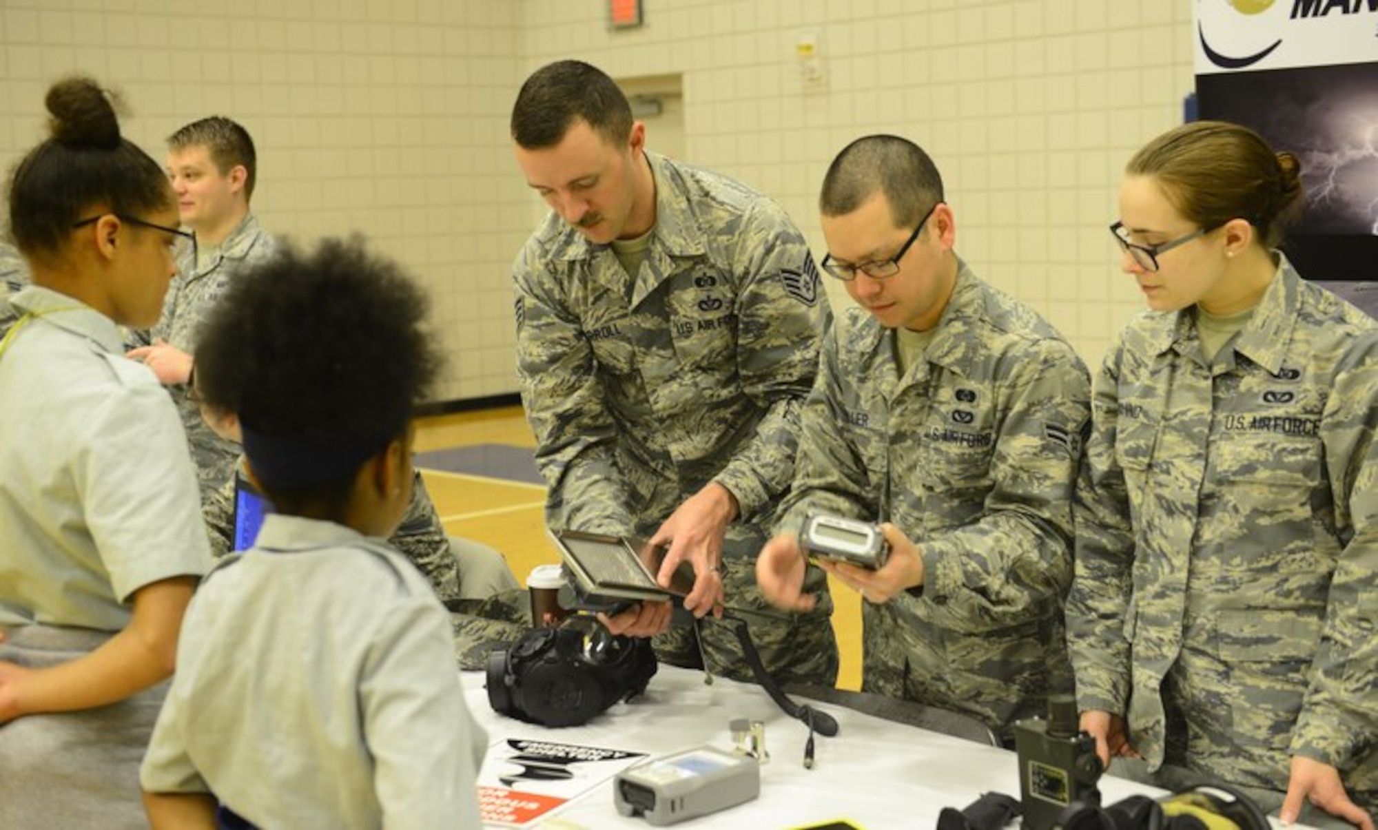 Emergency Management Airmen explain various pieces of equipment to Wichita-area students March 29, 2017, at McConnell Air Force Base, Kan. McConnell Airmen host science, technology, engineering and mathematics events regularly to encourage students to pursue STEM-related careers.