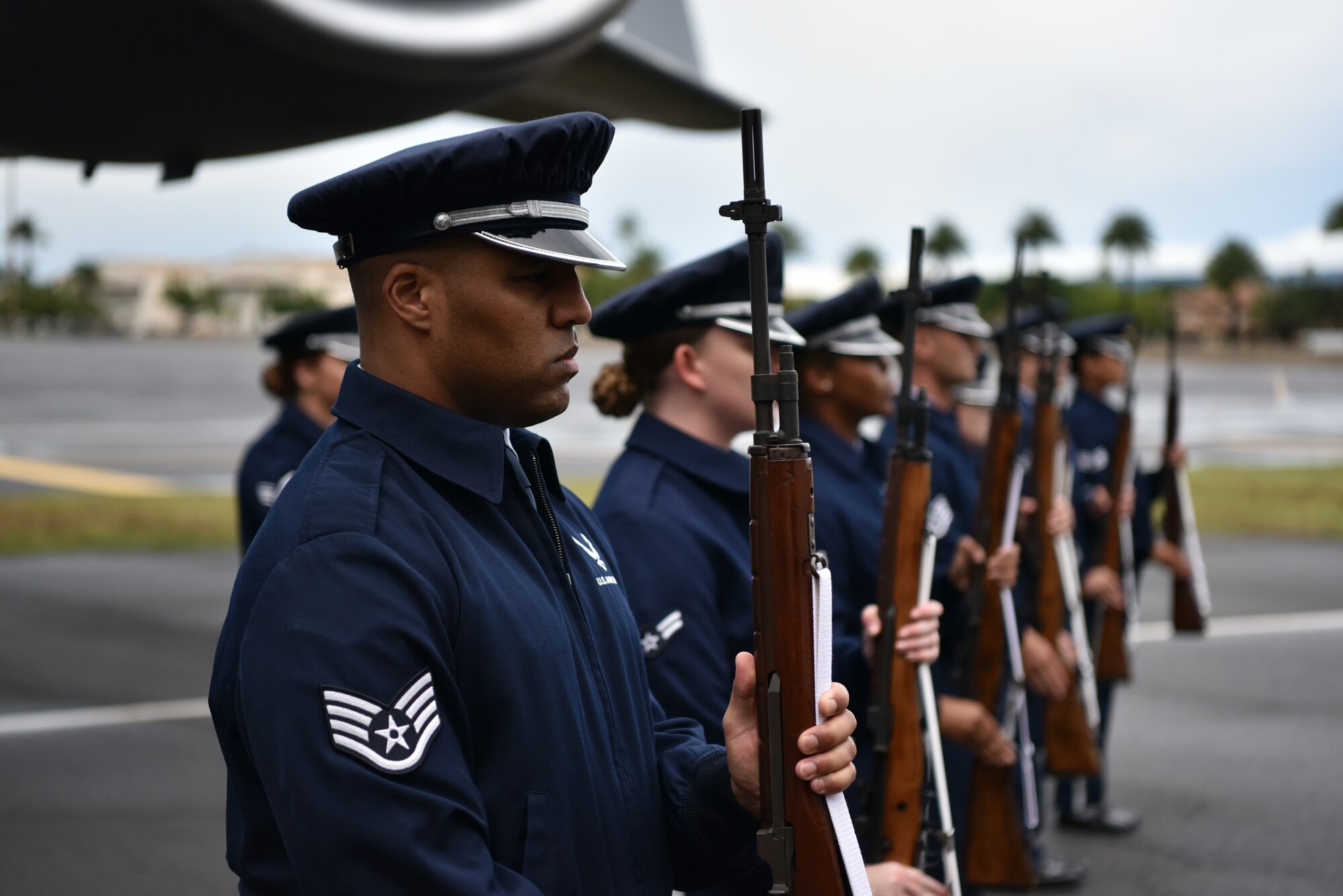 The Honor Guard practices performing a three-volley salute before the December 7th Remembrance Ceremony at Joint Base Pearl Harbor-Hickam, Hawaii, Dec. 7, 2021. Historically, three volleys of rifle fire were fired to indicate that the casualties had been cared for in a combat environment, and that the fighting could resume. As time passed, these volleys became an official military custom that survives to this day. (U.S. Air Force photo by 1st Lt. Benjamin Aronson)