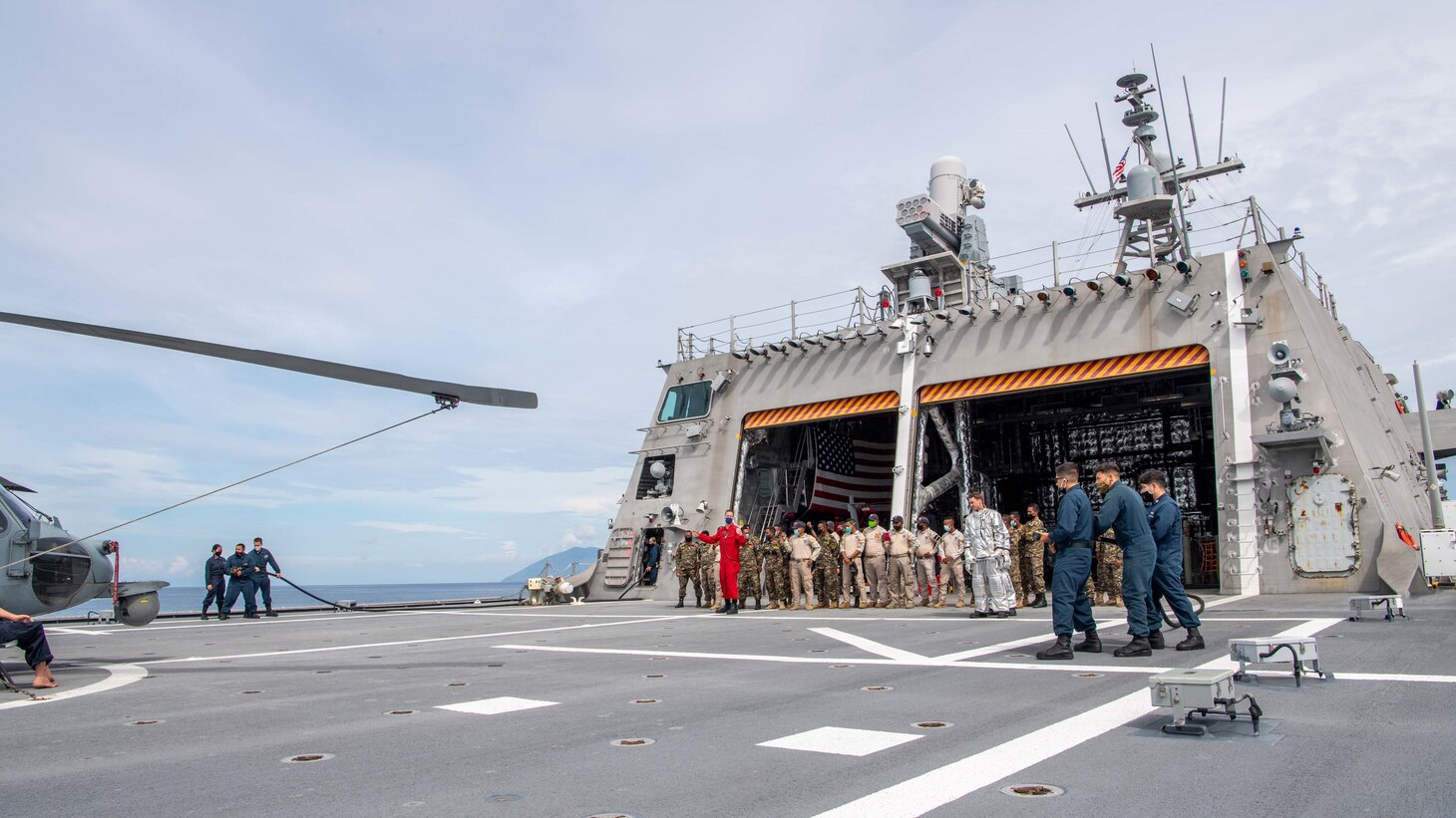 Sailors conduct flight deck firefighting training with members of the Timor-Leste Defense Force during Cooperation Afloat Readiness and Training (CARAT) from the flight deck aboard Independence-variant littoral combat ship USS Charleston (LCS 18). In its 27th year, the CARAT series is comprised of multinational exercises, designed to enhance U.S. and partnered navies’ abilities to operate together in response to traditional and non-traditional maritime security challenges in the Indo-Pacific region. Charleston, part of Destroyer Squadron (DESRON) 7, is on a rotational deployment in the U.S. 7th Fleet area of operation to enhance interoperability with partners and serve as a ready-response force in support of a free and open Indo-Pacific region.