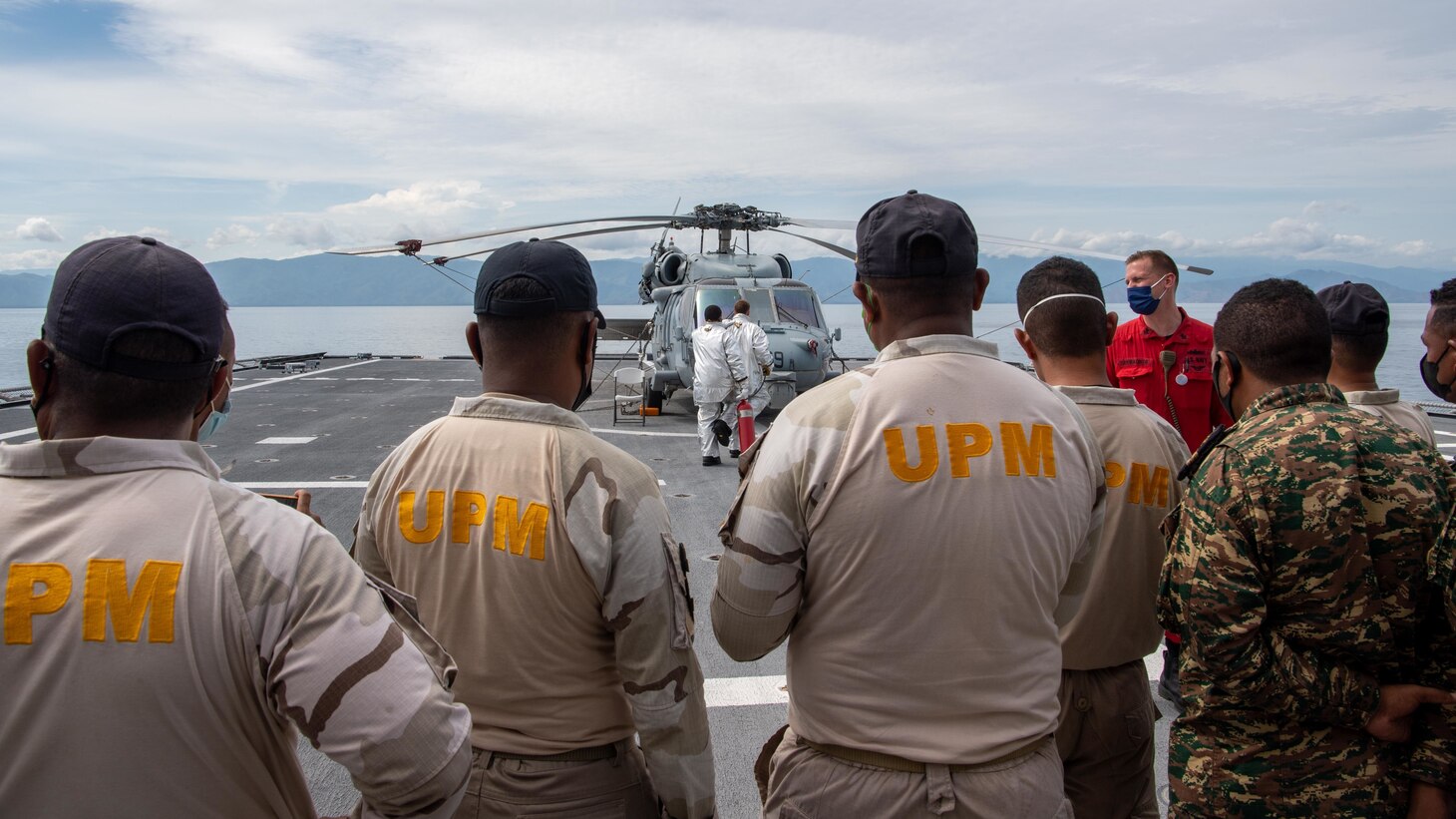 Sailors conduct flight deck firefighting training with members of the Timor-Leste Defense Force during Cooperation Afloat Readiness and Training (CARAT) from the flight deck aboard Independence-variant littoral combat ship USS Charleston (LCS 18). In its 27th year, the CARAT series is comprised of multinational exercises, designed to enhance U.S. and partnered navies’ abilities to operate together in response to traditional and non-traditional maritime security challenges in the Indo-Pacific region. Charleston, part of Destroyer Squadron (DESRON) 7, is on a rotational deployment in the U.S. 7th Fleet area of operation to enhance interoperability with partners and serve as a ready-response force in support of a free and open Indo-Pacific region. (U.S. Navy photo by Mass Communication Specialist 2nd Class Ryan M. Breeden)