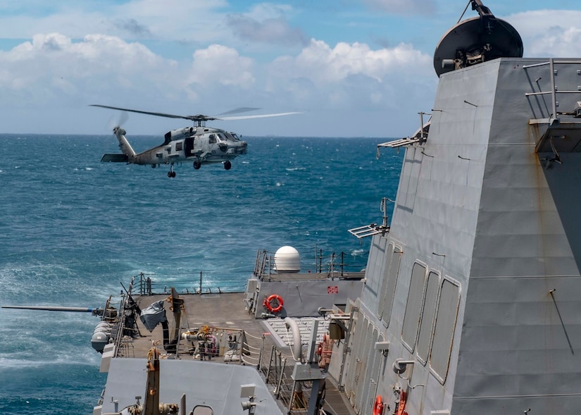 A helicopter takes off from a ship in the Taiwan Strait.