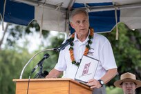 PEARL HARBOR, Hawaii (Dec. 7, 2021) - Gregory J. Slavonic, former Under Secretary of the Navy, Acting and former Assistant Secretary of the Navy for Manpower and Reserve Affairs and Rear Admiral (Retired), speaks during the 2021 USS Oklahoma (BB-37) Memorial Ceremony. This year commemorated the 80th anniversary of the Japanese attack on Pearl Harbor on Dec. 7, 1941. (U.S. Navy Photo by MC1 Jeffrey Hanshaw/Released).