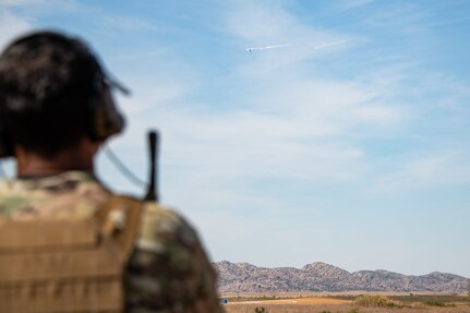 man watches F-16 fire flares