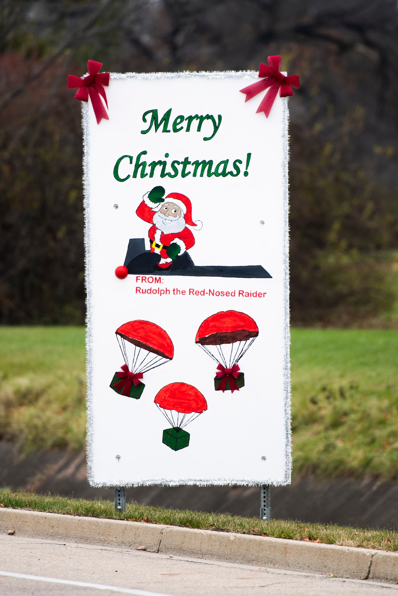 Giant Christmas cards designed by base organizations line Skeel Ave on Wright-Patterson Air Force Base, Ohio. The cards were an attempt to keep people socially connected during COVID-19. (U.S. Air Force photo by Wesley Farnsworth)