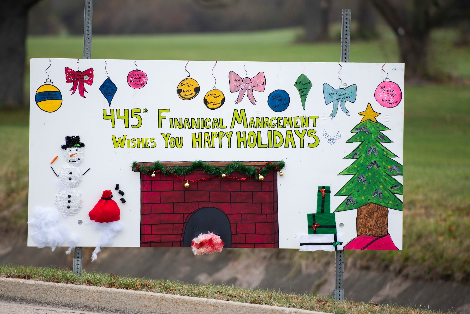 Giant Christmas cards designed by base organizations line Skeel Ave on Wright-Patterson Air Force Base, Ohio. The cards were an attempt to keep people socially connected during COVID-19. (U.S. Air Force photo by Wesley Farnsworth)