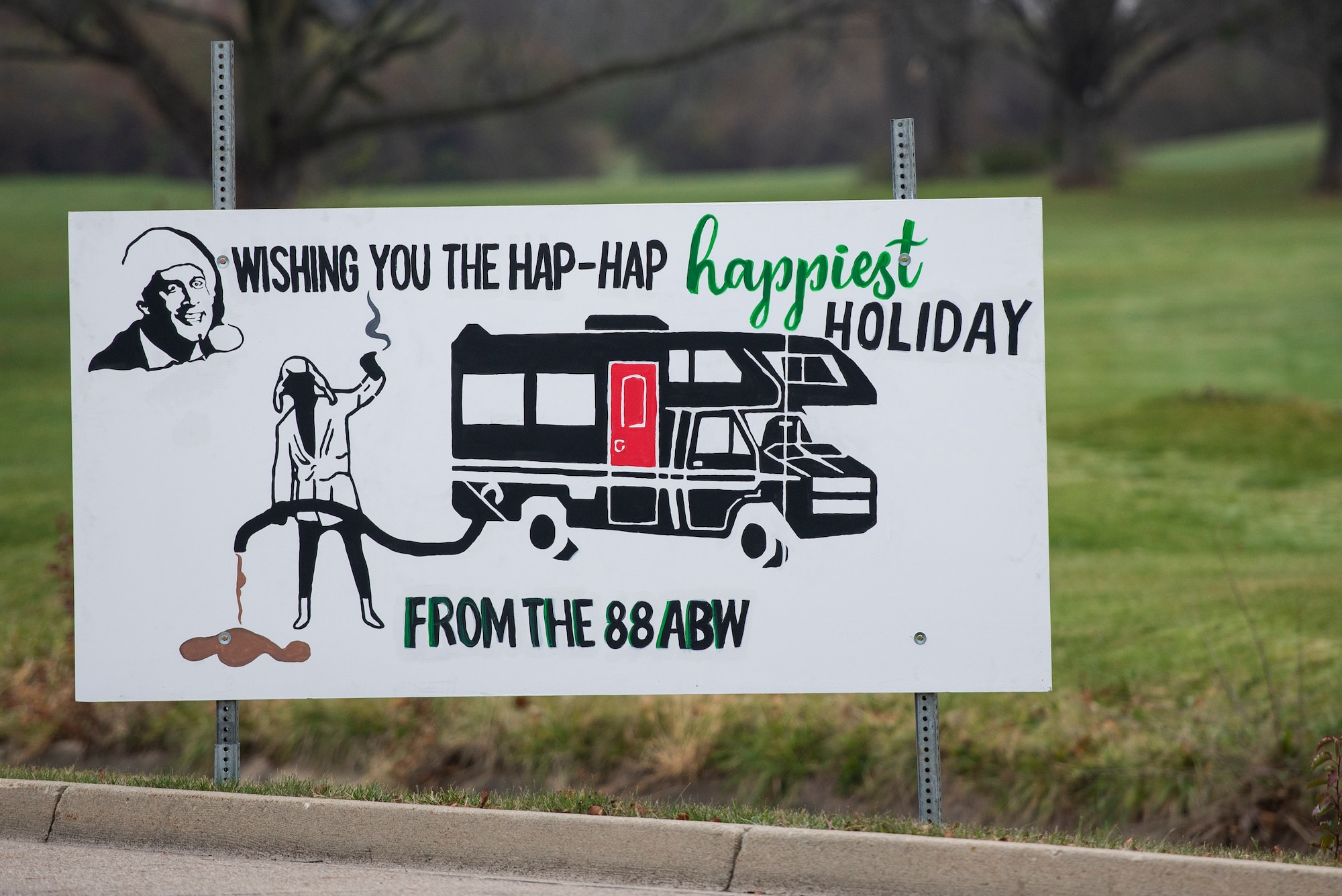 Giant Christmas cards designed by base organizations line Skeel Ave on Wright-Patterson Air Force Base, Ohio. The cards were an attempt to keep people socially connected during COVID-19. (U.S. Air Force photo by Wesley Farnsworth)