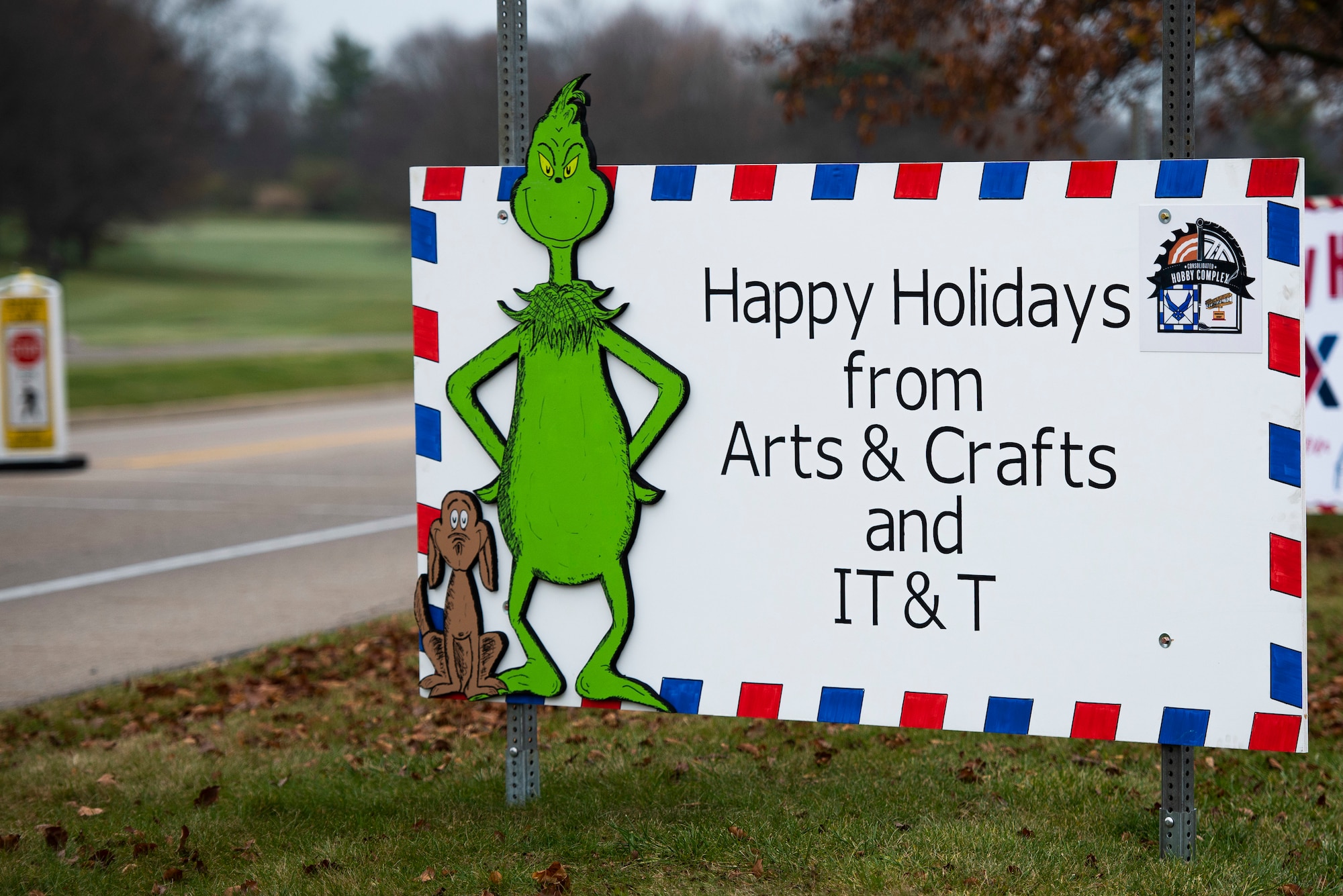 Giant Christmas cards designed by base organizations line Skeel Ave on Wright-Patterson Air Force Base, Ohio. The cards were an attempt to keep people socially connected during COVID-19. (U.S. Air Force photo by Wesley Farnsworth)