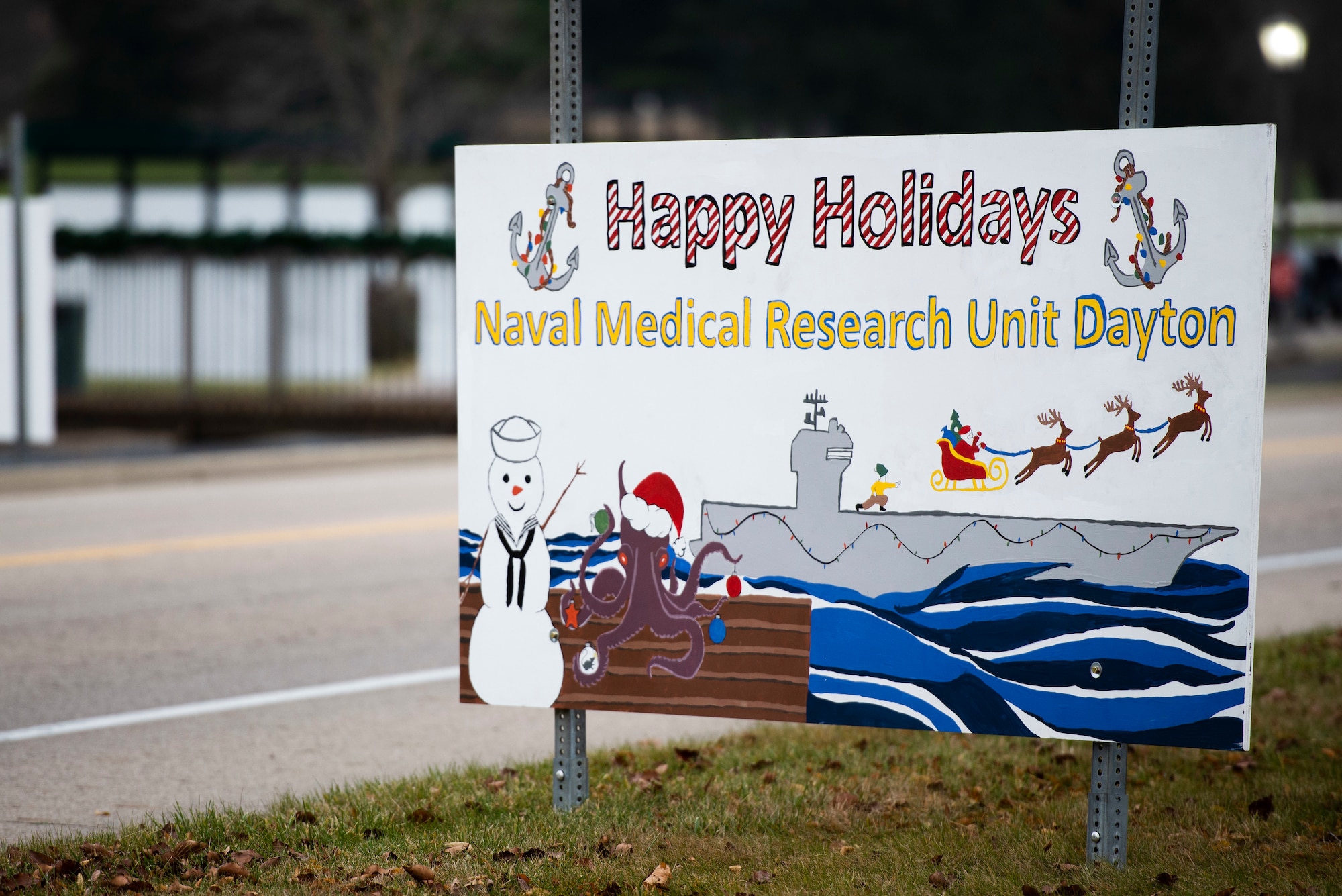 Giant Christmas cards designed by base organizations line Skeel Ave on Wright-Patterson Air Force Base, Ohio. The cards were an attempt to keep people socially connected during COVID-19. (U.S. Air Force photo by Wesley Farnsworth)