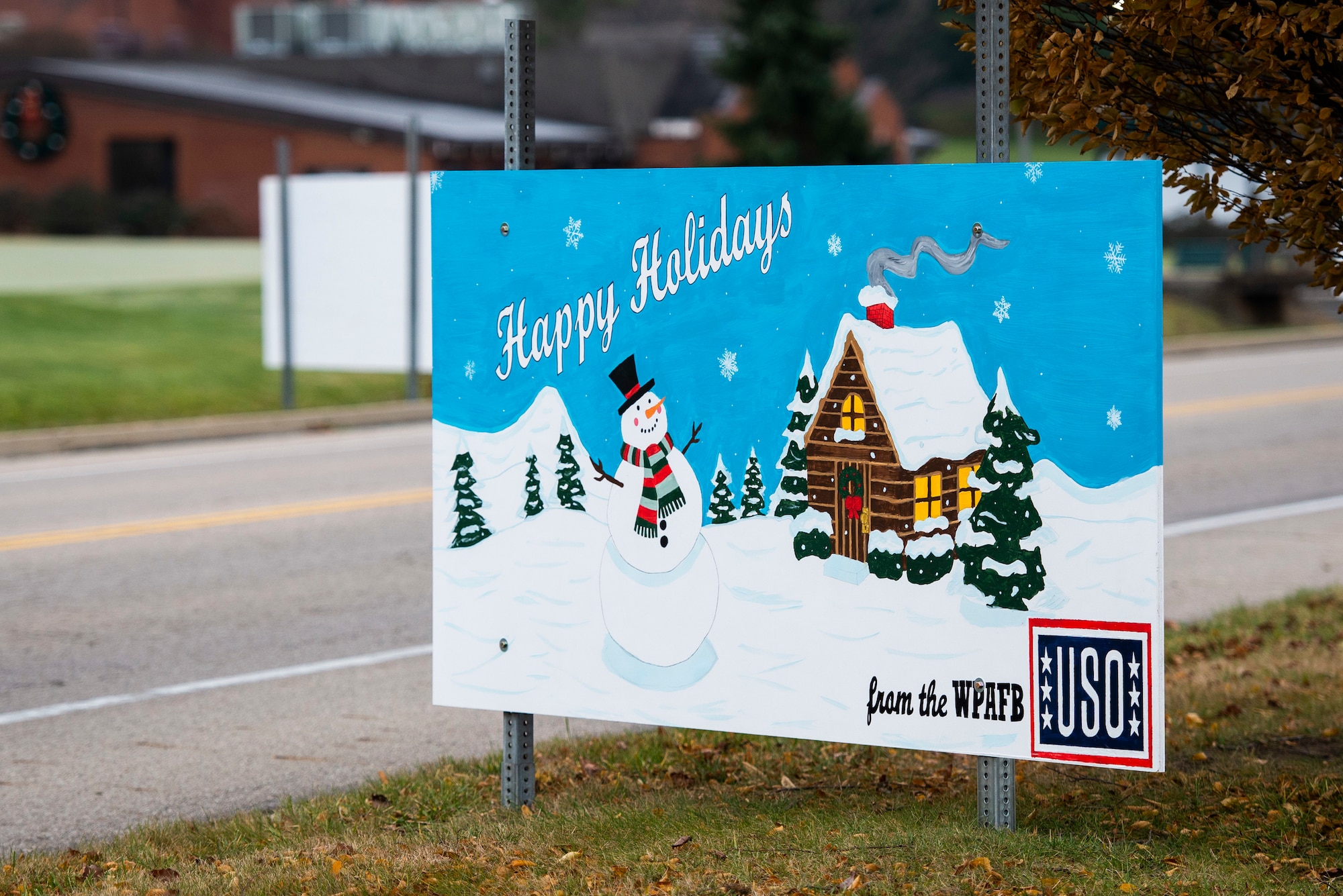 Giant Christmas cards designed by base organizations line Skeel Ave on Wright-Patterson Air Force Base, Ohio. The cards were an attempt to keep people socially connected during COVID-19. (U.S. Air Force photo by Wesley Farnsworth)