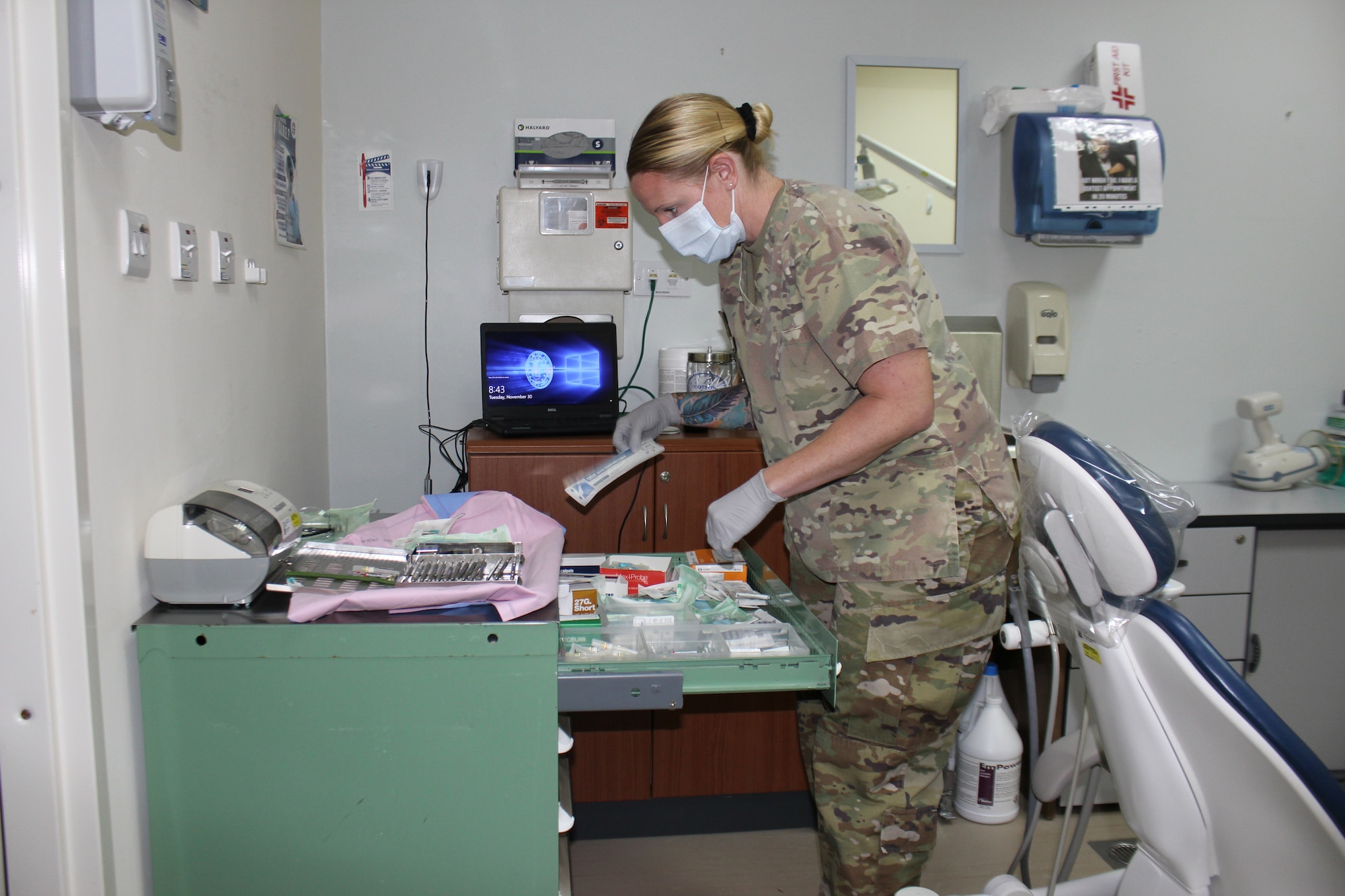 Tech. Sgt. Tiffani Lawter, a dental technician with the 380th Medical Group, prepares instruments for a dental procedure at the medical clinic at Al Dhafra Air Base, United Arab Emirates, Nov. 30, 2021. The dental office at the clinic provides emergency dental services to support the 380th Air Expeditionary Wing and other U.S. operations at the base. Lawter is forward deployed from the 131st Bomb Wing, Missouri Air National Guard.