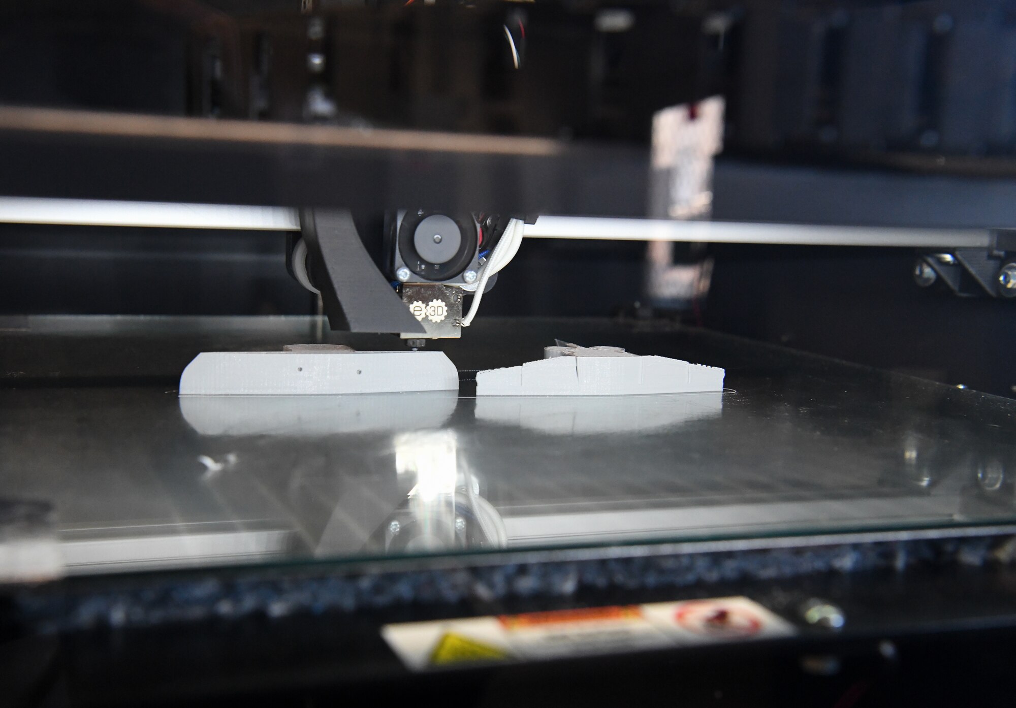 A test model is printed by a 3D printer in the Arnold Engineering Development Complex Innovation Center at Arnold Air Force Base, Tenn., Sept. 29, 2021. The 3D printer will provide engineers a way to efficiently and economically create models for research. (U.S. Air Force photo by Jill Pickett)
