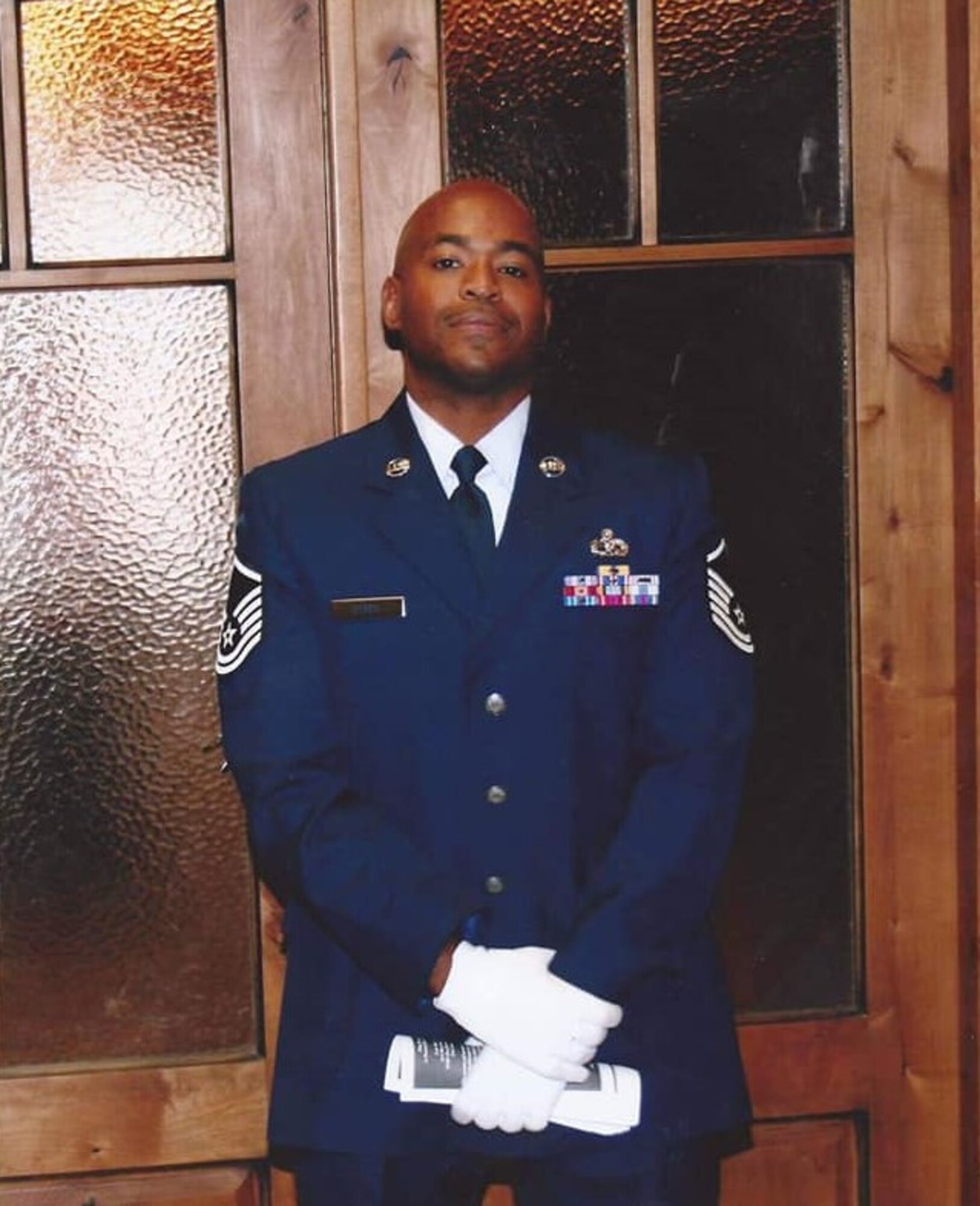 Master Sgt. Melvin Peele Jr., the former supervisor of 			U.S. Space Force Master Sgt. Karl Musick, DEL 4, Detachment 1 senior enlisted leader, poses in his blues.