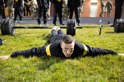 U.S. Army National Guard, Spc.Spencer Fayles, a member of 97th Troop Command, performs hand-release push-ups during a modified fitness test at the Best Warrior Competition on Camp Williams, Utah, Nov. 8. 2021.