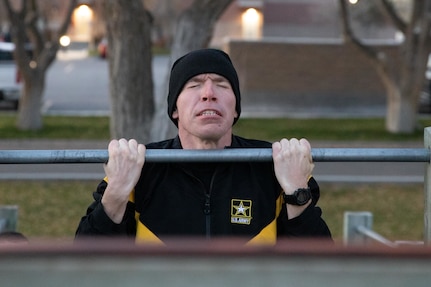 Utah Army National Guard Master Sgt. Shane Richards of Joint Forces Headquarters completes a pull up during the physical assessment at the Utah National Guard Best Warrior Competition on Camp Williams, Utah, Nov. 8. 2021.