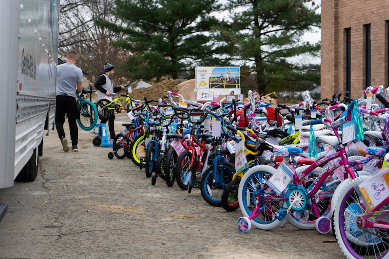 U.S. Marines with Bravo Company, 4th Law Enforcement Battalion, Force Headquarters Group, offload bikes that were donated to the Toys for Tots program in Pittsburgh, Dec. 3, 2021. The Toys for Tots program is run by Reserve Marines across the country, to collect and deliver toys to less fortunate children for Christmas. (U.S. Marine Corps photo by Cpl. Gavin Umboh)