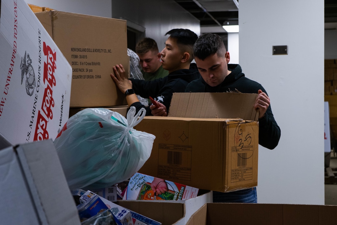 U.S. Marines with Bravo Company, 4th Law Enforcement Battalion, Force Headquarters Group, organize and prepare toys that were donated to the Toys for Tots program for delivery in Pittsburgh, Dec. 3, 2021. The Toys for Tots program is run by Reserve Marines across the country, to collect and deliver toys to less fortunate children for Christmas. (U.S. Marine Corps photo by Cpl. Gavin Umboh)