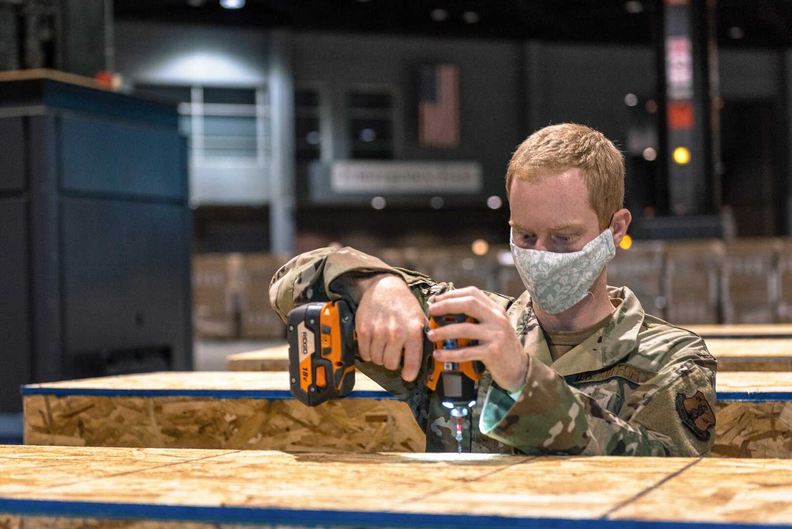 U.S. Air Force Airman 1st Class Dylan Heeter, an operations intelligence specialist with the 182nd Operations Support Squadron, Illinois Air National Guard, reinforces equipment containers at the McCormick Center alternative care facility in Chicago, May 5, 2020. The alternative care facility was built with the help of Illinois National Guardsmen to support the state’s healthcare infrastructure in the event of a patient overflow caused by the COVID-19 pandemic. (U.S. Air National Guard photo by Tech. Sgt. Lealan Buehrer)