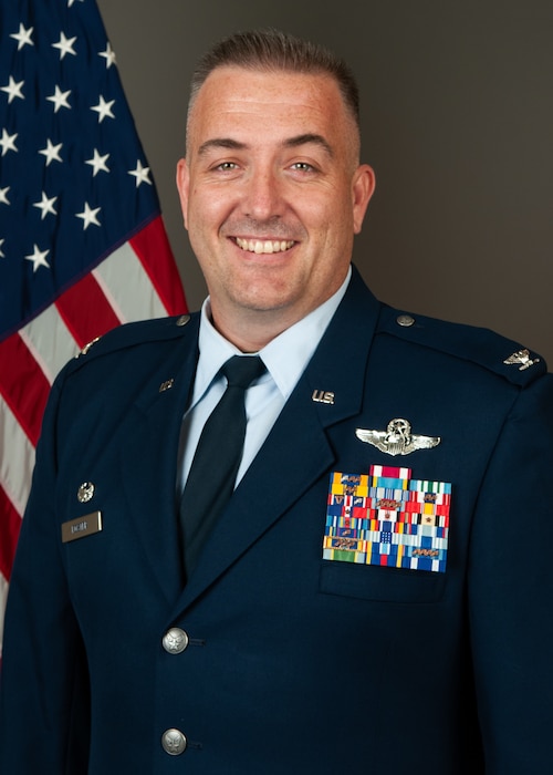 A military officer poses for an official portrait