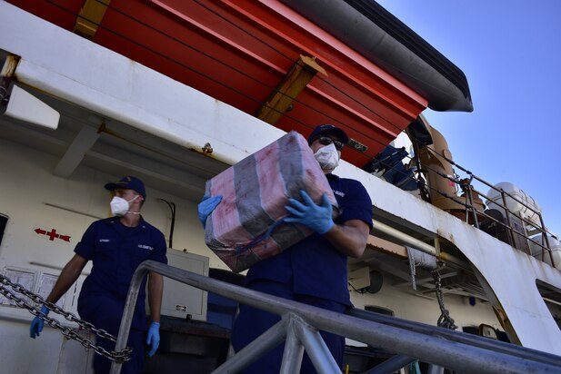 Coast Guard Cutter Dauntless' (WMEC-624) crew offloads more than $148 million in illegal narcotics at Base Miami Beach, Dec. 7, 2021.