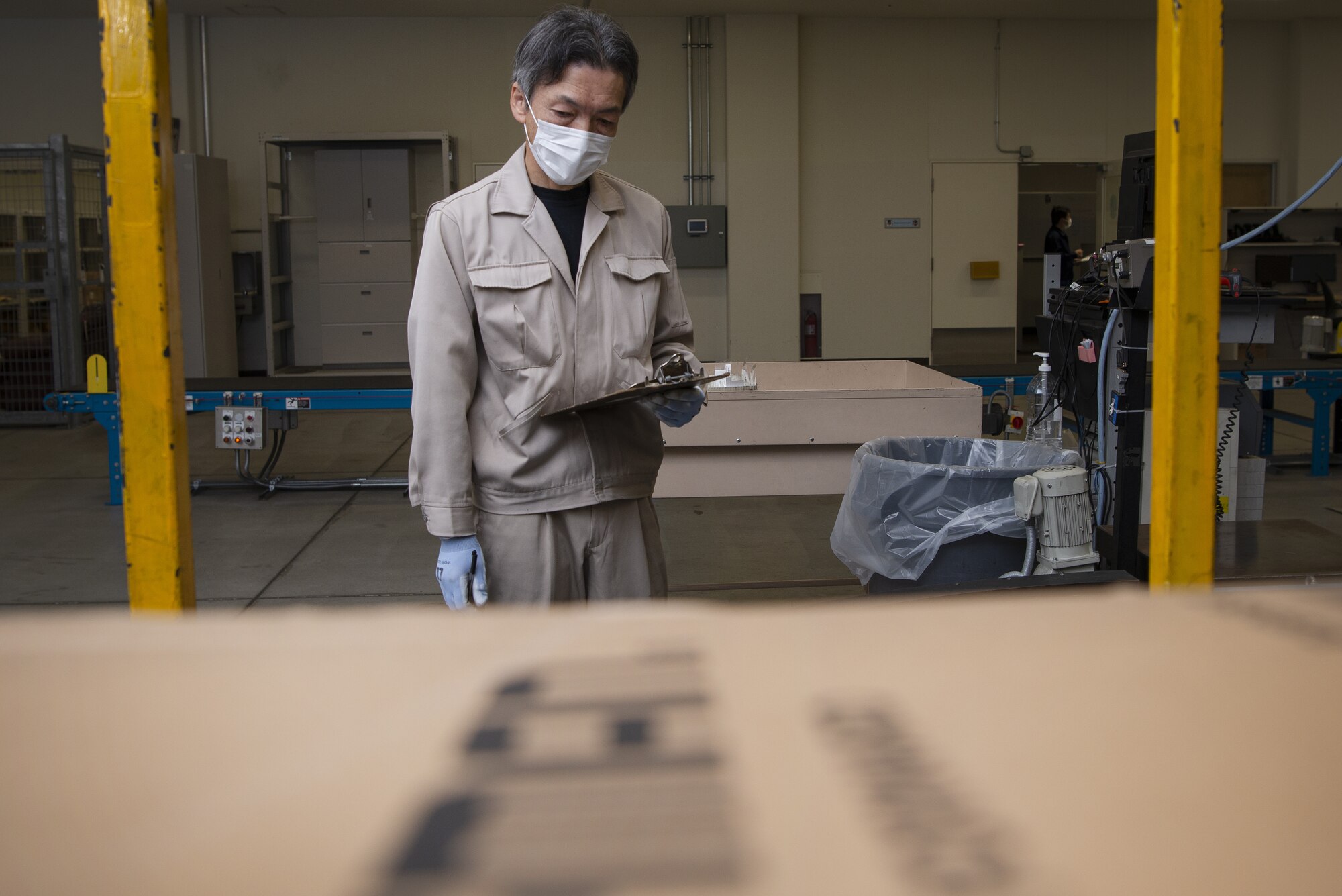 Shigeru Ishii, Pacific Air Forces Air Postal Squadron mail sorting clerk, receives and accounts for mail Dec. 6, 2021, at Yokota Air Base, Japan. The PACAF AIRPS can receive two to three times the amount of mail during the holiday season, and work seven days a week to ensure an increased flow of mail can be sorted and delivered across the region. Yokota Air Base’s geographical location makes it an ideal place for the PACAF AIRPS due to the installation’s close proximity to the squadron’s detachments, and ability to collaborate with two international airports.