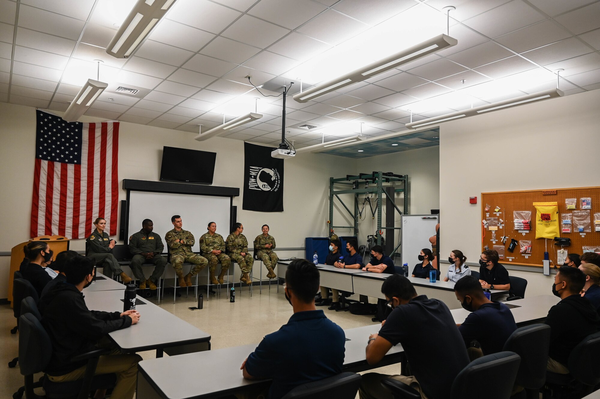 Cadets from the University of Hawaii Air Force Reserve Officer Training Corps learn about several Air Force job allocations during an Officer Panel at Joint Base Pearl Harbor-Hickam, Hawaii, Dec. 3, 2021. During the panel, five active-duty officers shared the differences in their jobs and their purpose towards enabling the Air Force’s mission. (U.S. Air Force photo by Staff Sgt. Alan Ricker)