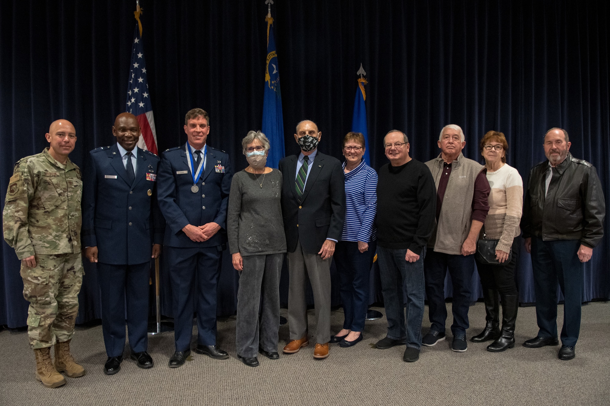 Maj. Gen. Ondra Berry, Nevada’s Adjutant General, poses for a photo with Col. David Chauvin, Nevada Chief of Staff, and Col. David Clark, special projects officer with the Nevada National Guard State Headquarters, alongside with previous Nevada Adjutant Generals. Clark was presented the Maj. Gen. Drennan A. Clark Order of Nevada medal by his father Maj. Gen. (ret.) Drennan Clark