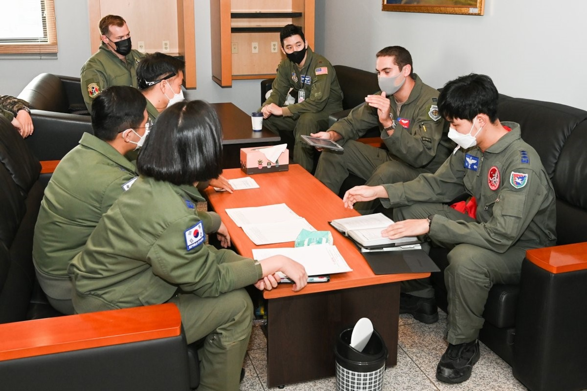 Republic of Korea and U.S. Air Force Airmen discuss plans for Operation Christmas Drop at Osan Air Base, Republic of Korea October 22, 2021. This year marks the 70th anniversary of the mission. (Courtesy photo from Republic of Korea Air Force)