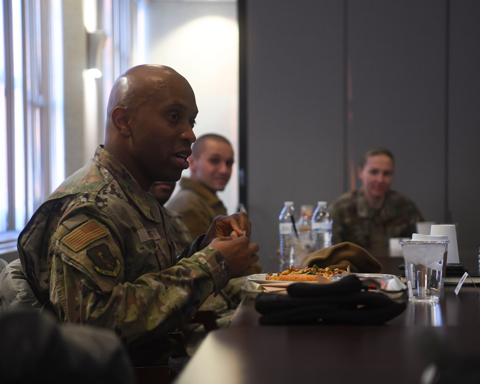Chief Bruce has breakfast with Airmen from base to discuss any question or concerns they may have for him.
