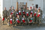 Airmen from the 148th Fighter Wing, Minnesota Air National Guard, at Al Dhafra Air Base, United Arab Emirates, Dec. 8, 2021. The Airmen are forward-deployed, working in a variety of duties to support the Air Force mission at ADAB.