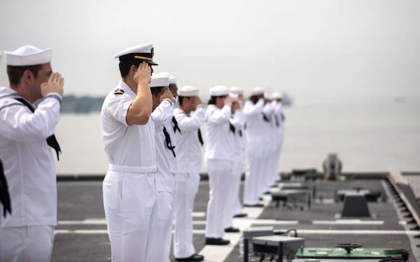 CHATTOGRAM, Bangladesh (Dec. 8, 2021) – Sailors render honors to Bangladesh Navy ships as the Independence-variant littoral combat ship USS Tulsa (LCS 16) arrives at Chattogram, Bangladesh, during Cooperation Afloat Readiness and Training (CARAT) Bangladesh 2021. In its 27th year, CARAT series is comprised of multinational exercises, designed to enhance U.S. and partner navies’ abilities to operate together in response to traditional and non-traditional maritime security challenges in the Indo-Pacific region. Tulsa, part of Destroyer Squadron (DESRON) 7, is on a rotational deployment, operating in the U.S. 7th Fleet area of operations to enhance interoperability with partners and serve as a ready-response force in support of a free and open Indo-Pacific region. (U.S. Navy photo by Mass Communication Specialist 1st Class Devin M. Langer)