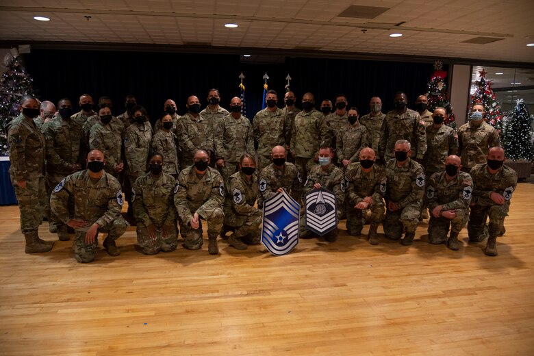 PETERSON SPACE FORCE BASE, Colo. – Members of the Colorado Springs Area Chiefs' Group pose for a photo after the Peterson Space Force Base, Schriever SFB and Cheyenne Mountain Space Force Station chief master sergeant release notifications at Peterson SFB, Colorado, Dec. 6, 2021.