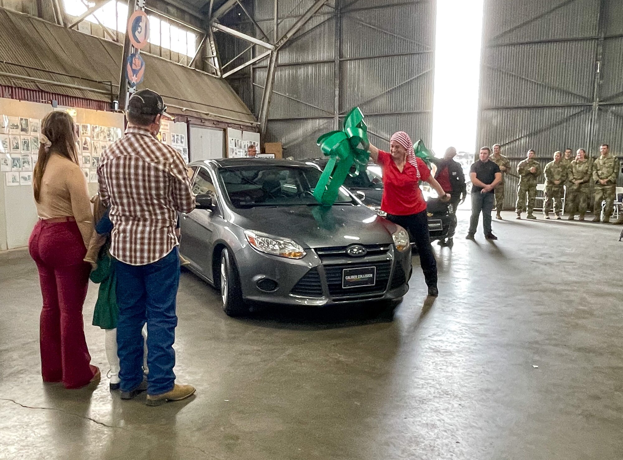 Members of the 301st Fighter Wing, along with wing senior leadership, participated in the sixth annual Holidays & Heroes community event at the Vintage Flying Museum in Fort Worth, Texas on Dec. 5, 2021.