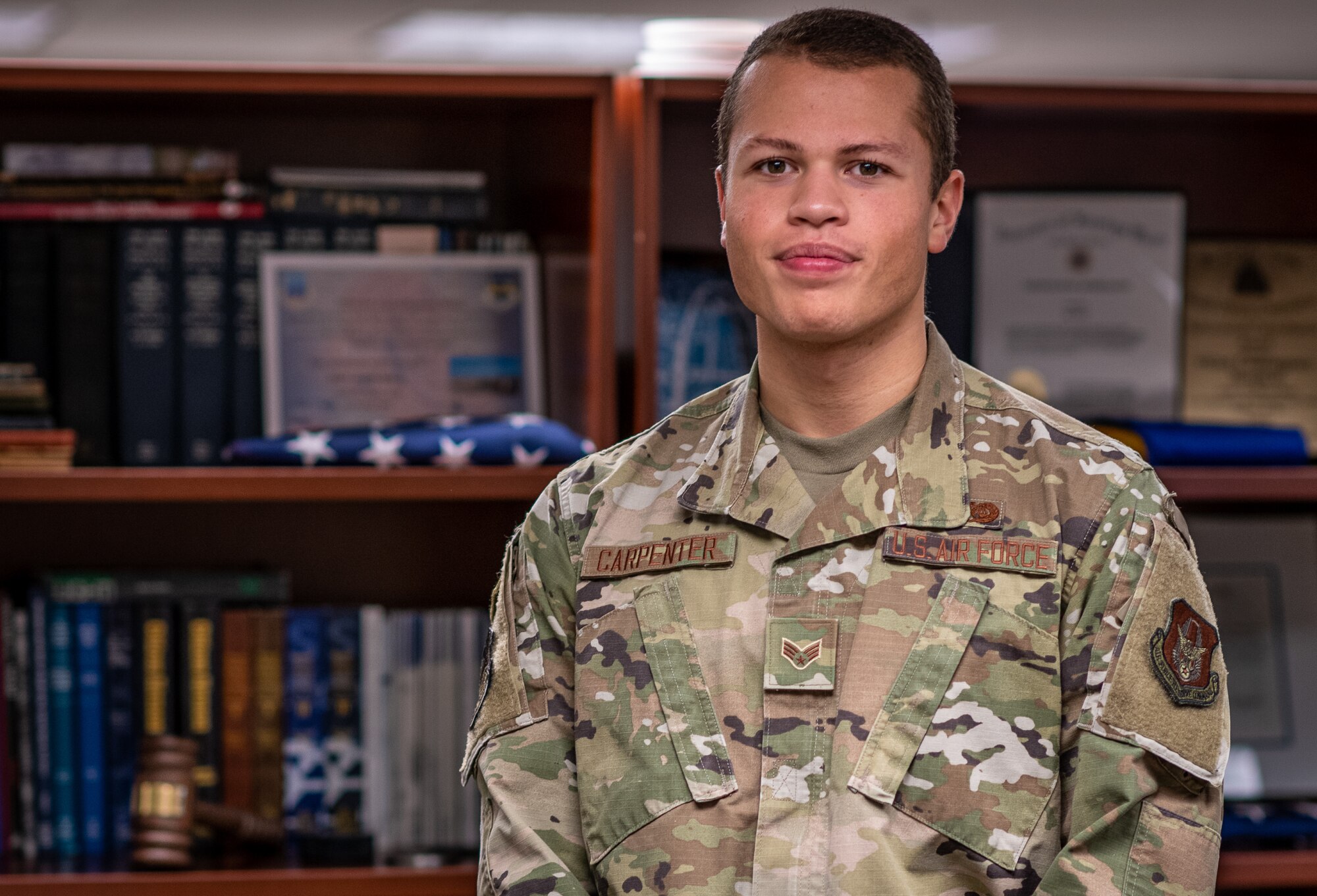 Senior Airman Nathan Carpenter, 932nd Airlift Wing paralegal, poses for an environmental portrait as part of the 932nd AW Year of the Airman campaign, Dec. 5, Scott Air Force Base, Illinois.  Carpenter is a current Air Force ROTC cadet and pursuing a career in helicopter aviation. (U.S. Air Force photo by Master Sgt. Christopher Parr)