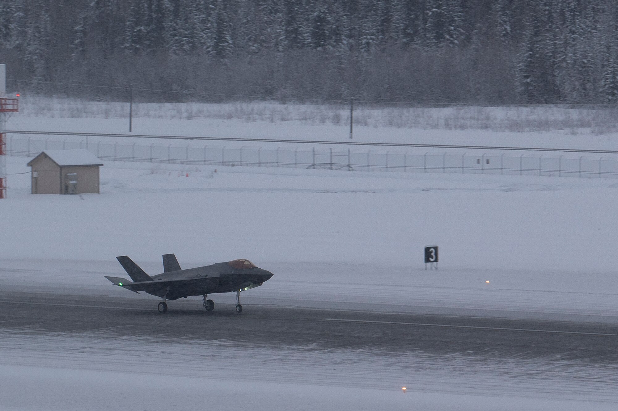 A U.S. Air Force F-35A Lightning II assigned to the 355th Fighter Squadron taxis on the runway upon initial delivery to Eielson Air Force Base, Alaska, Dec. 10, 2021. The 354th Fighter Wing is expected to receive a total of 54 F-35s by the end of 2022. (U.S. Air Force photo by Staff Sgt. Zade Vadnais)