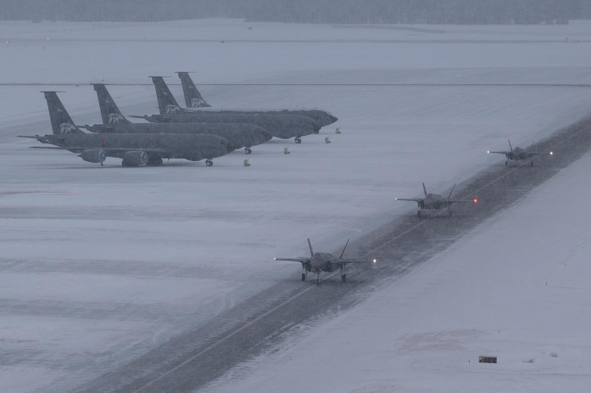 Three U.S. Air Force F-35A Lightning II aircraft assigned to the 355th Fighter Squadron taxi on the runway upon initial delivery to Eielson Air Force Base, Alaska, Dec. 10, 2021. The 354th Fighter Wing is expected to receive a total of 54 F-35s by the end of 2022. (U.S. Air Force photo by Staff Sgt. Zade Vadnais)
