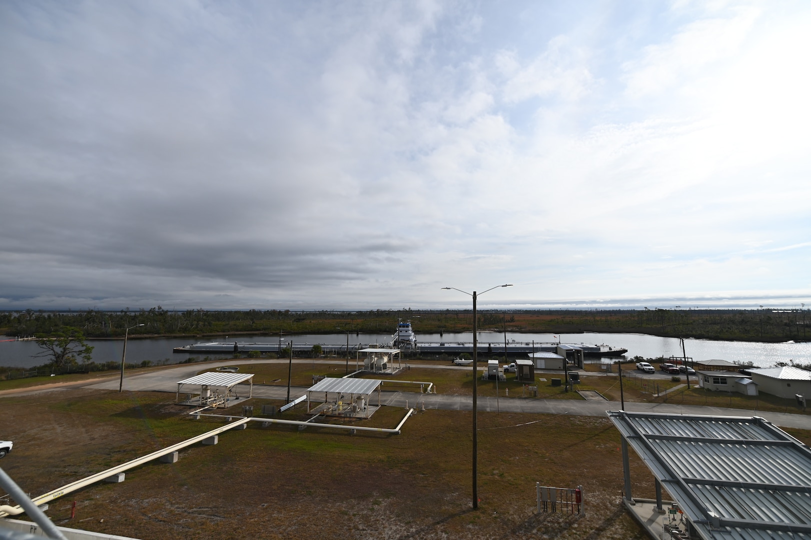 A fuel barge sits at Tyndall's fuel compound