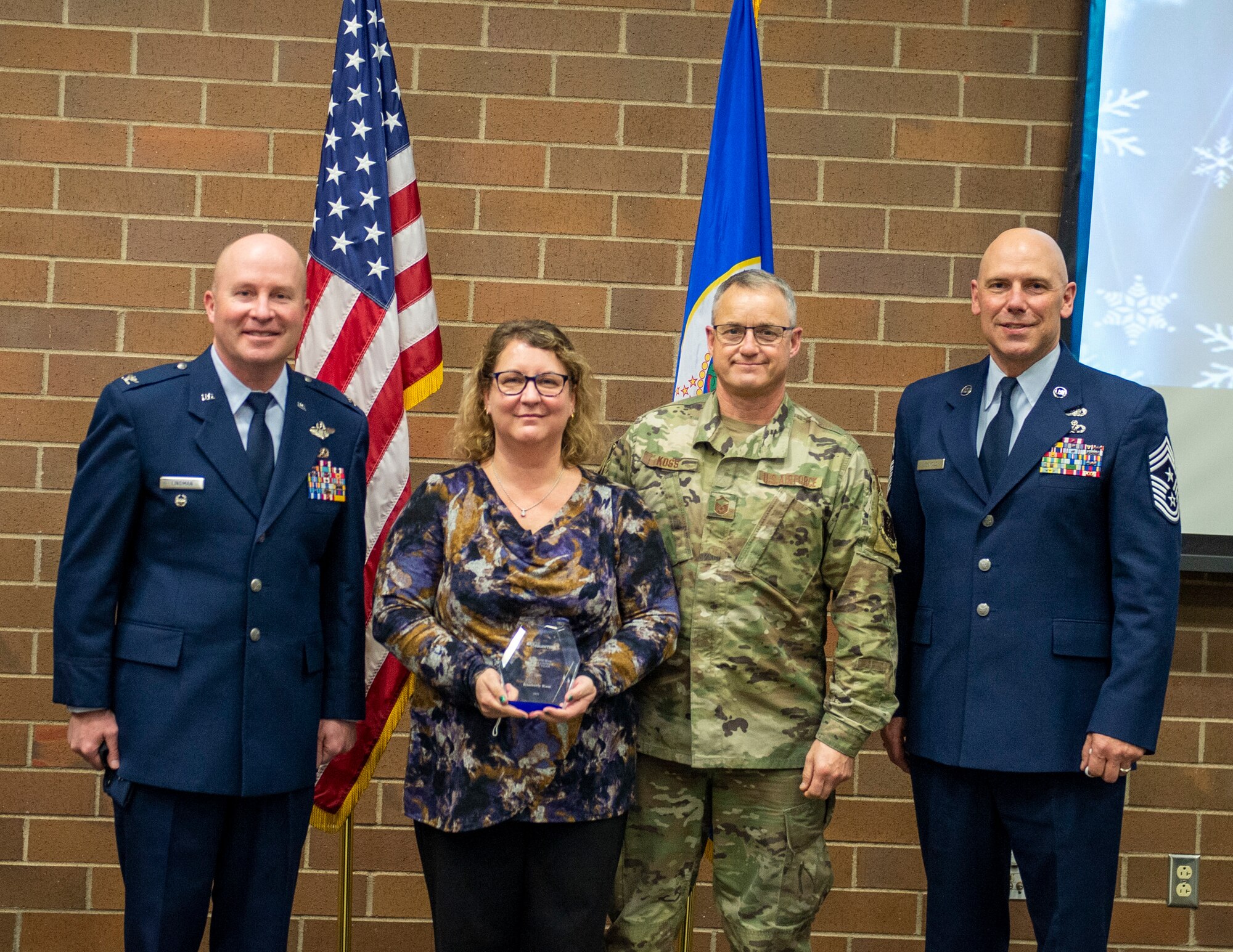 U.S. Air Force Airmen from the 133rd Airlift Wing, along with friends and family attend the 2021 Wing Awards Ceremony in St. Paul, Minn., Dec. 11, 2021.