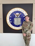 Airman 1st Class Jessicah Sharp, an aerospace medical technician with the 168th Medical Group in the Alaska Air National Guard, poses for a photo during her first drill back in Alaska from Operation Allies Welcome at Joint Base McGuire-Dix-Lakehurst in New Jersey, which she participated in from Sept. 10 to Oct. 31.