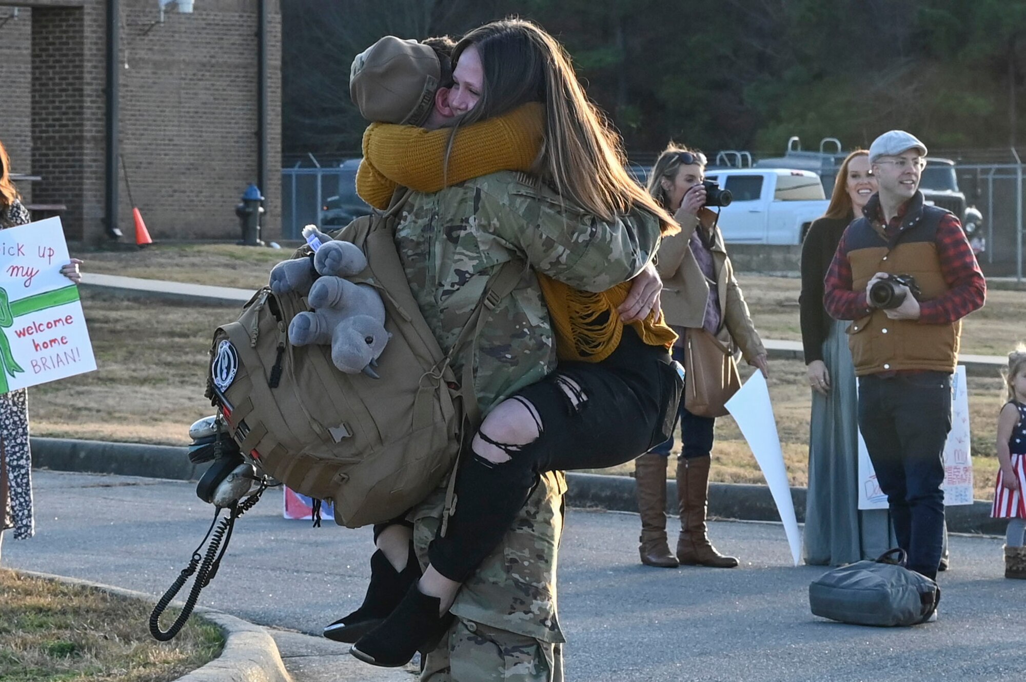 An Airman greets his wife upon returning from deployment.