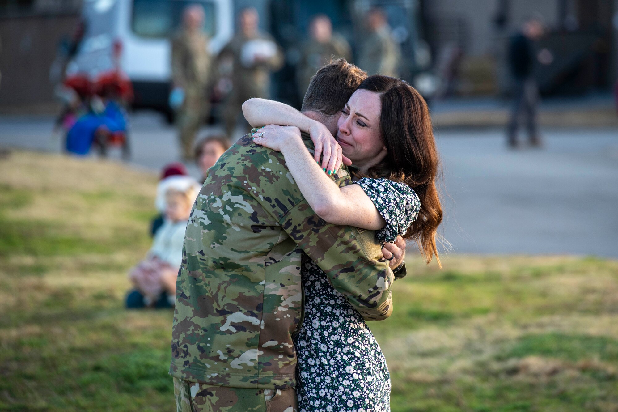 An Airmen greets his wife upon returning from deployment.