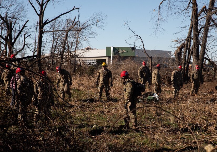 Army Guardsmen with the 301st Chemical Battalion and Air Guardsmen with the 123rd Airlift Wing continue search and rescue missions in Mayfield, Ky. on December 12th, 2021.

"I feel like extraction training has prepared me really well for a real world scenario like this," said Pvt. Tyler Price, 301st Chem. Co. "We have shown that we have a really good response time with people coming together from all over the state and they have all been able to get here quickly."