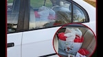 Car with gifts in back seat