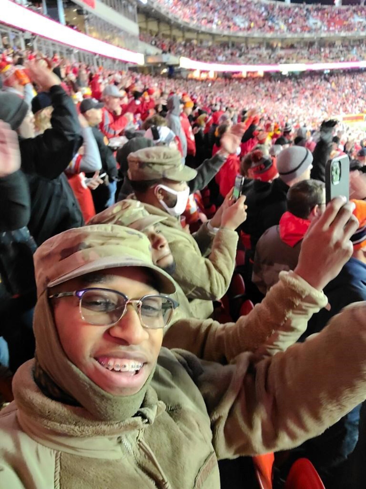A photo of A1C Posey at Chiefs game.