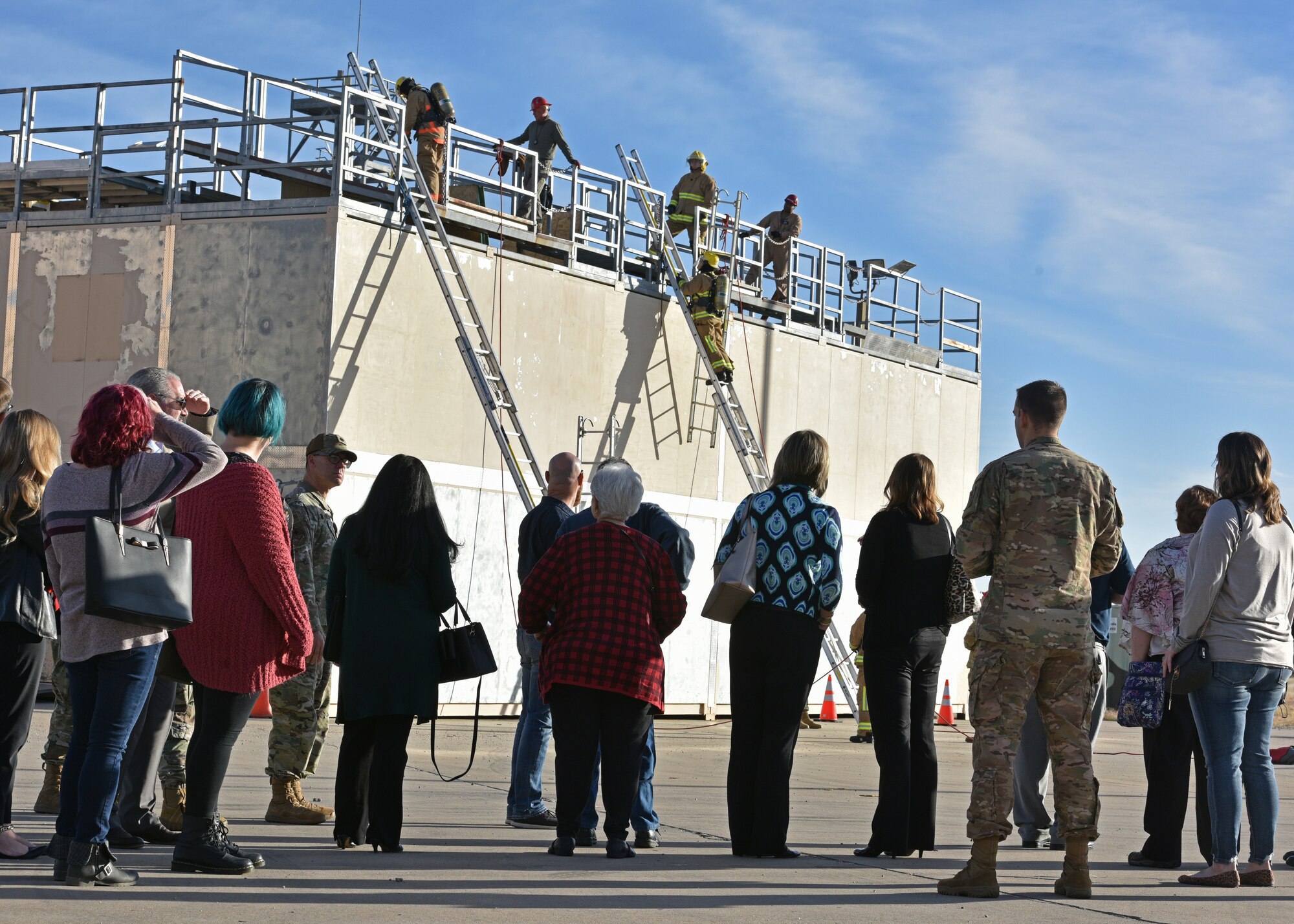 Local mental health providers watch 17th Training Wing students train during an open house at the Louis F. Garland Department of Defense Fire Academy, Dec. 3, 2021. Over 20 members from different local mental health organizations attended the open house to obtain information and insight into what goes on in the lives of the military members stationed at Goodfellow. (U.S. Air Force photo by Senior Airman Ashley Thrash)
